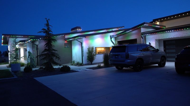 A roofline lit in red and green